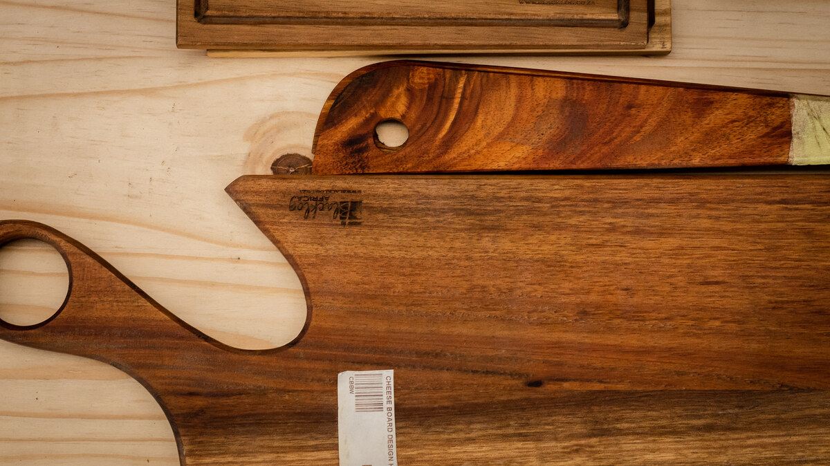 Close-up of wooden serving boards with handles