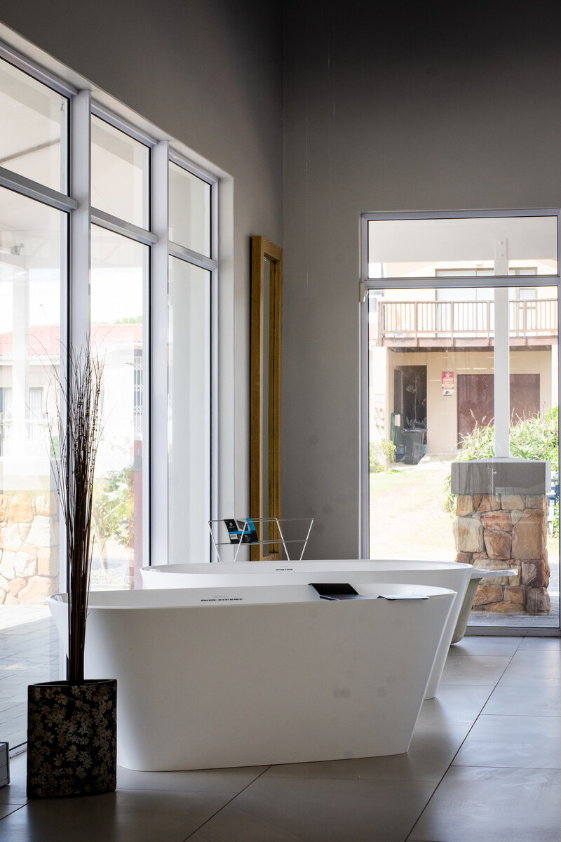Freestanding white bath in the bathroom showroom