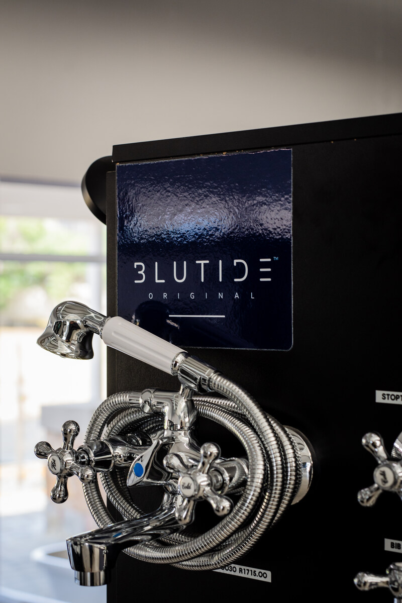 Blutide chrome shower and bath mixer on display