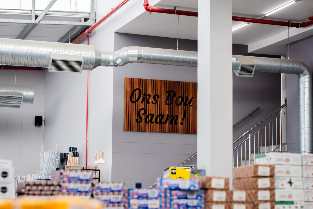 Ons Bou Saam sign and the stairs to the mezzanine