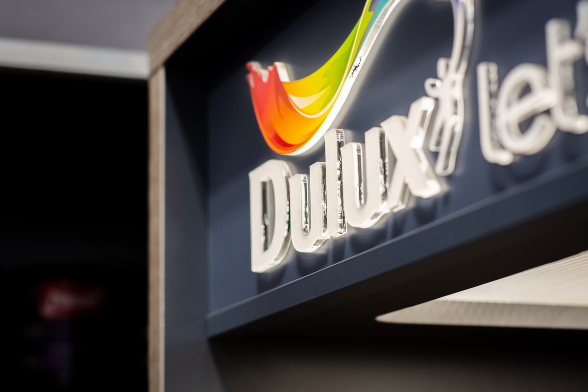 Dulux Let's Colour sign in the paint section