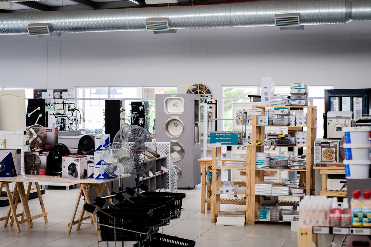 Showroom floor with fans, bathroom ware and shelving