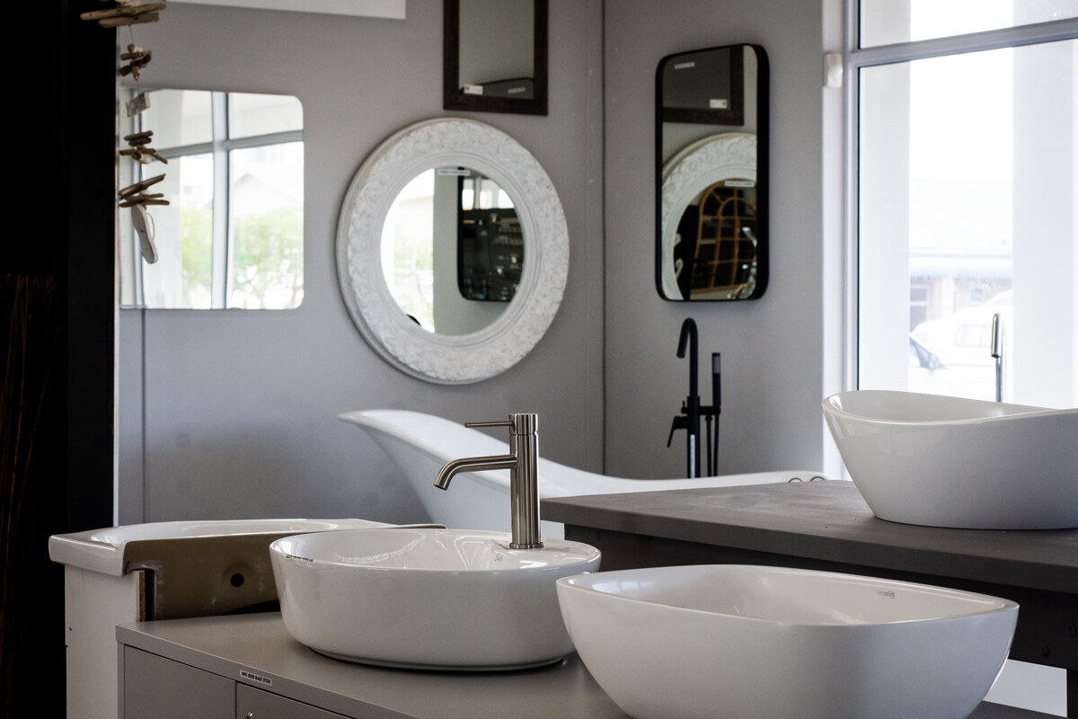 Vessel basins, mirrors and taps in the bathroom showroom